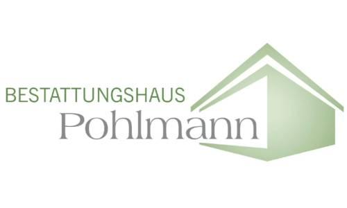 Grün/Grauer Firmenname mit grün angedeutetem Haus daneben