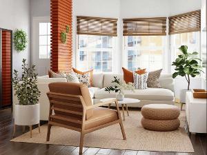 Ein Wohnzimmer mit weißem Sofa, einem Sessel und einem Couchtisch auf einem Teppich