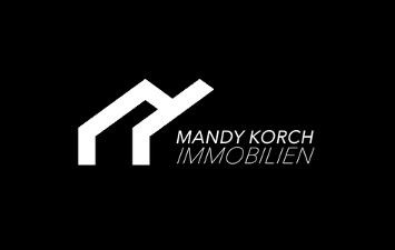 Mandy Korch Immobilien Logo, weiße Schrift auf schwarzem Untergrund