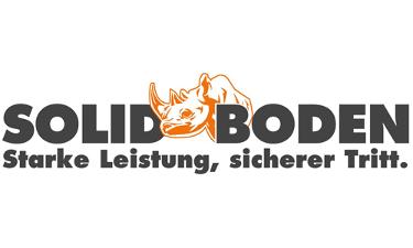 SOLID BODEN Logo, schwarze Schrift und ein orangefarbenes Nashorn auf weißem Untergrund