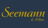 Seemann & Söhne KG Logo, gelbe Schrift auf dunkelblauem Untergrund