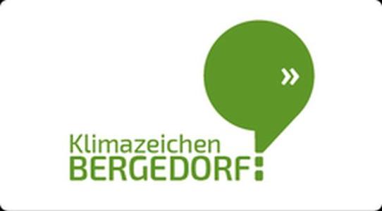 Ein grünes Logo Klimazeichen Bergedorf