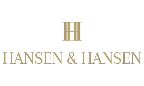 Logo von Hansen & Hansen Immobilien Kontor, goldene Schrift auf weißem Untergrund