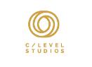 C-Level Studios CLS GmbH Logo, goldene Kreise und goldene Schrift auf weißem Untergrund