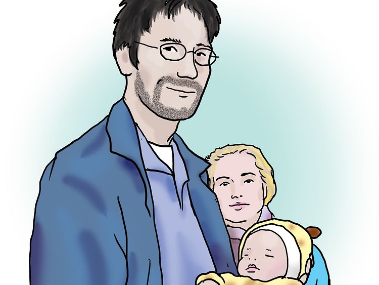  Eine junge Familie mit einem Baby
