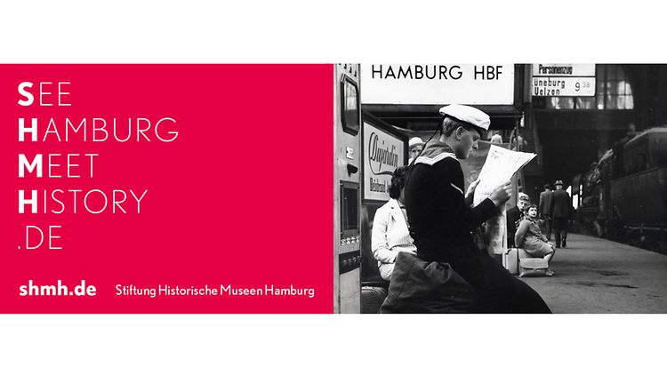  Ein Banner mit dem Schriftzug See Hamburg Meet History shmh.de mit dem historischen Bild eines Matrosen