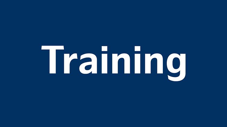  "Training" steht auf blauem Hintergrund