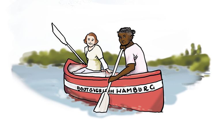  Zwei Menschen sitzen in einem Kanu und paddeln