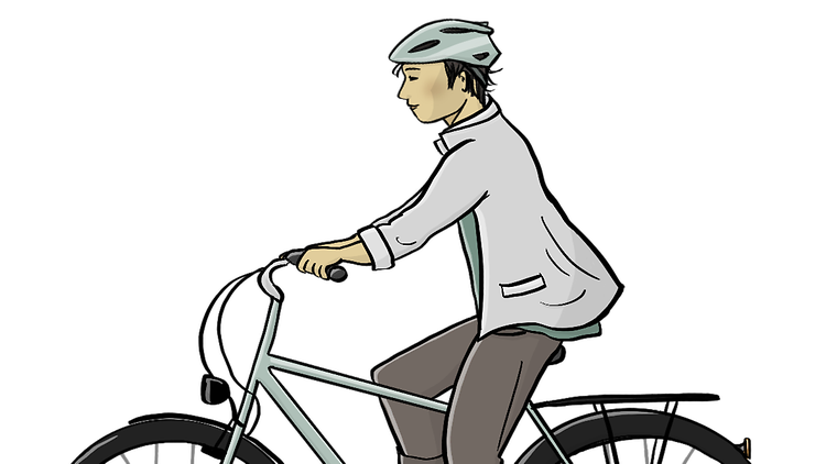 Eine Person fährt auf einem Fahrrad
