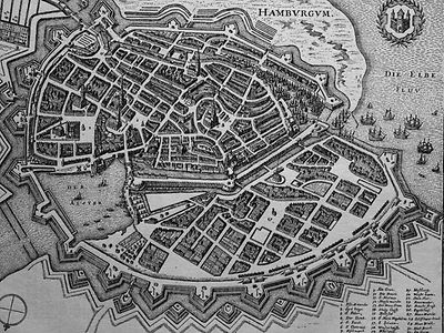  Man sieht eine graue Karte, auf der die Umrisse von Hamburg eingezeichnet sind. 